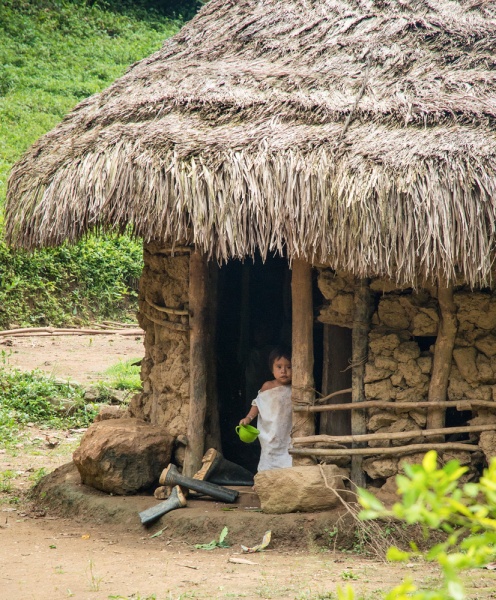 A local girl along the Ciudad Perdido hike, Colombia by Wandering Wheatleys