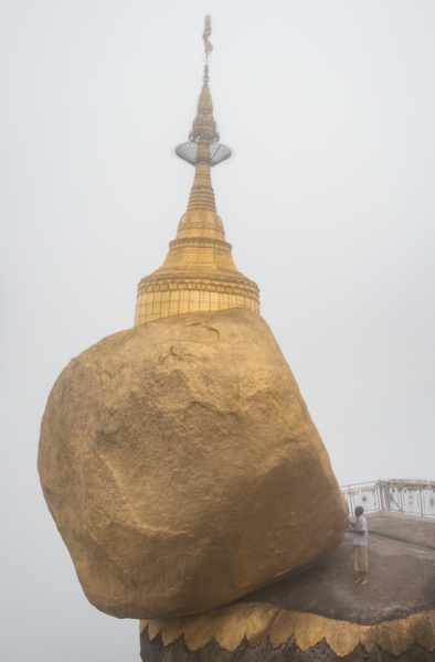 Myanmar Off The Beaten Track: Myanmar Adventures: Placing gold leaf on the Golden Rock at Kyaiktiyo Pagoda, Myanmar by Wandering Wheatleys