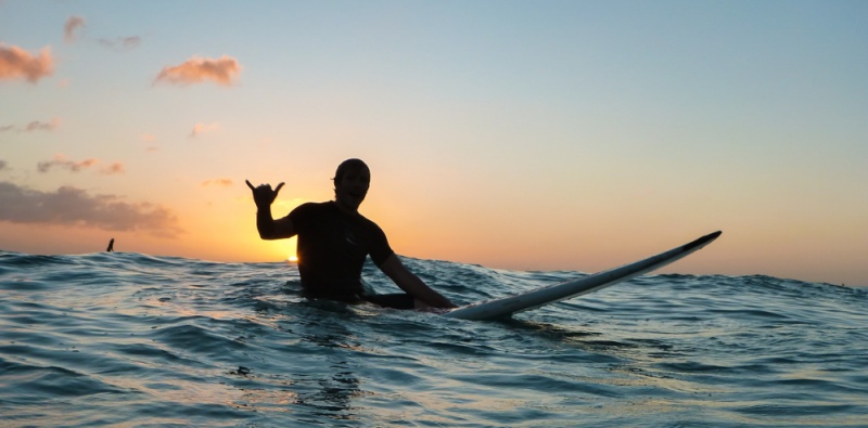 Secret Things to do in Oahu: Insider Hawaii Tips: Surfing at Sunset in Waikiki, Oahu, Hawaii by Wandering Wheatleys