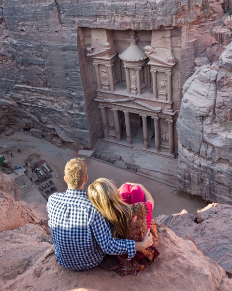 Guide to the Lost City of Petra, Jordan: Views from above of the Treasury at Petra, Jordan by Wandering Wheatleys