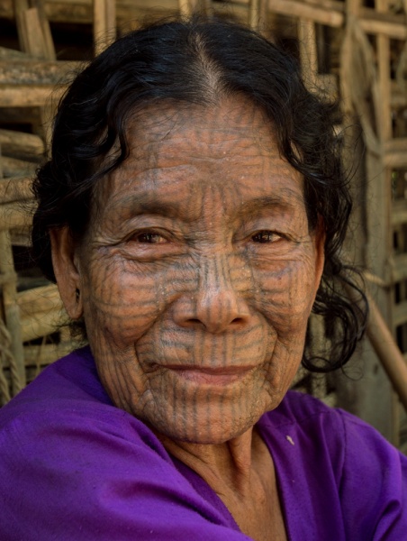 Tattooed Face woman from the Chin Villages, Myanmar by Wandering Wheatleys