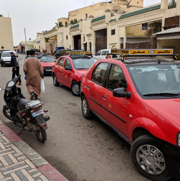 Red Petite Taxis in Fes, Morocco by Wandering Wheatleys