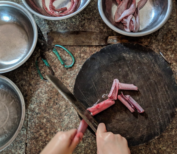 Eat Cobra or Snake in Vietnam: Preparing the snake to cook