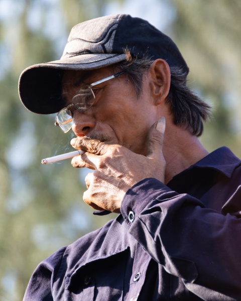 Hoi An Photography Tour, Vietnam: Shipyard Worker on a Smoke Break