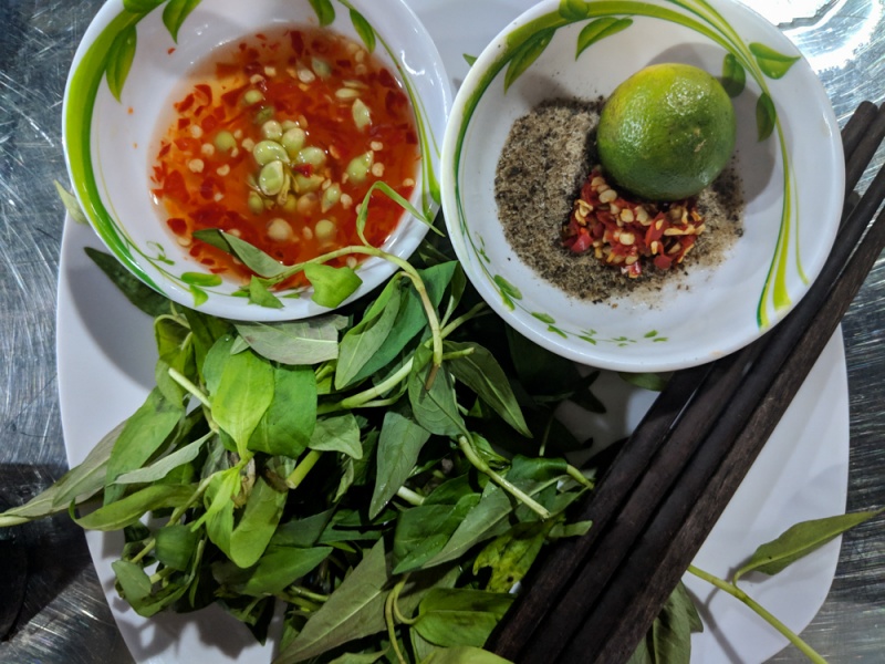 How to Order and Eat Snail, Shellfish, and Seafood in Vietnam: Vietnamese Coriander (Rau Ram), Salt, Pepper, Chili, and Lime (Muoi Tieu Chanh), and Fish Sauce (Nuoc Mam)