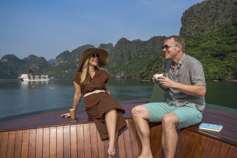 Enjoying Coffee on Deck on the Ylang Cruise Ship Through Heritage Cruise Lines in Lan Ha Bay Vietnam