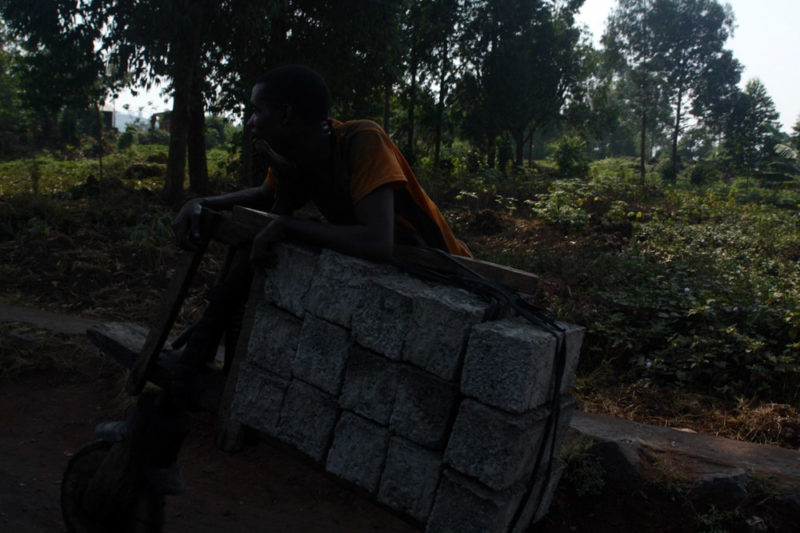 Virunga Travel Guide: Boy Moving Bricks