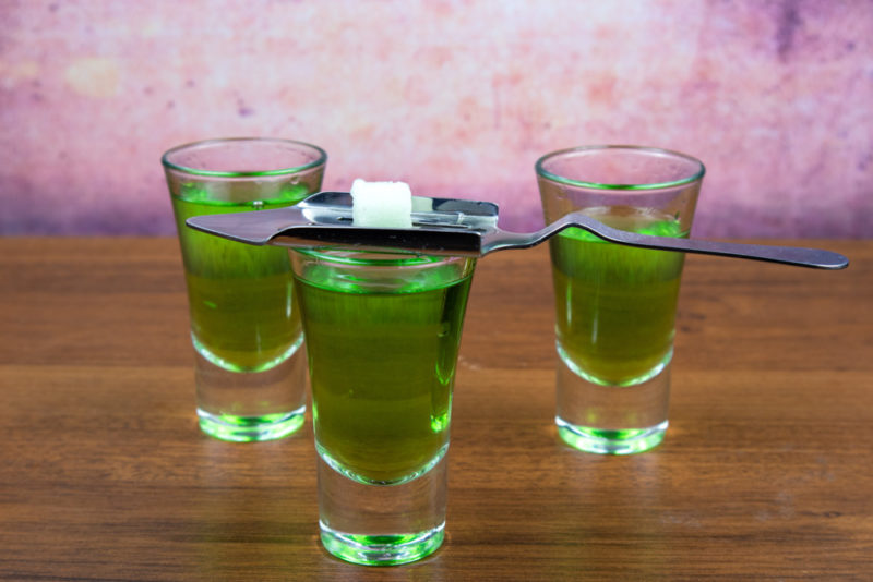 Best Things to do in Nice: Chase the green fairy with a glass of absinthe