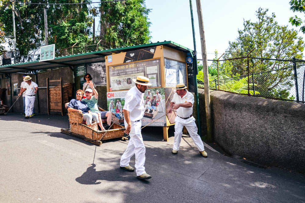 Cool Things to do in Portugal: Madeira on a traditional toboggan