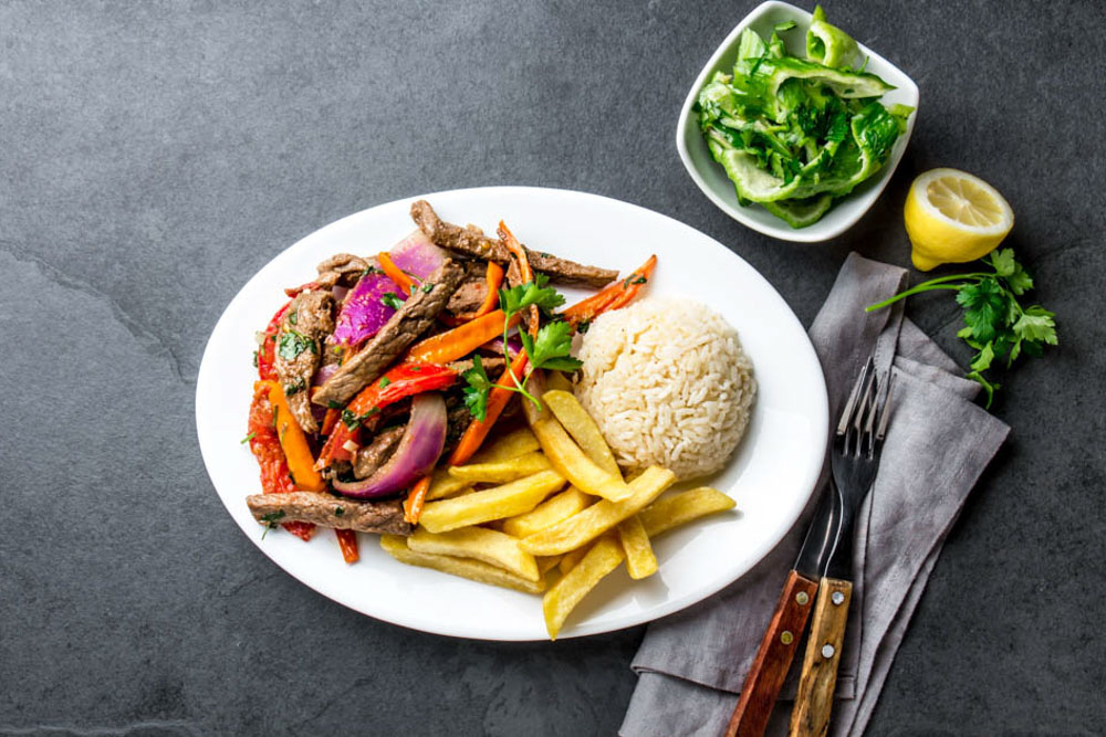 Local Foods to try in Peru: Lomo Saltado