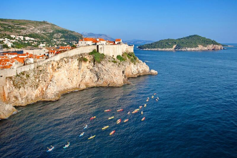 2 Weeks in Croatia Itinerary: People Kayaking around the City Sea Walls